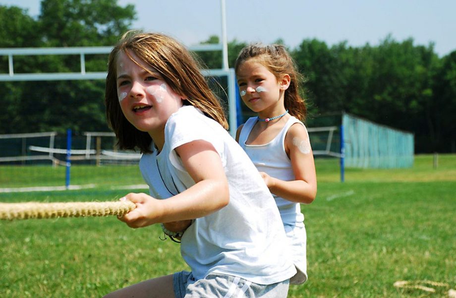 Girls playing tug of war for color war