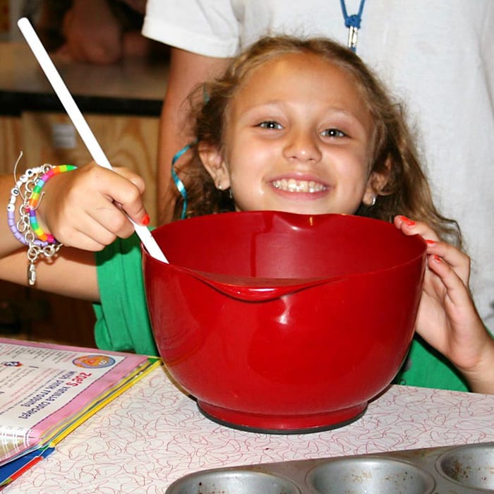 girl camper cooking