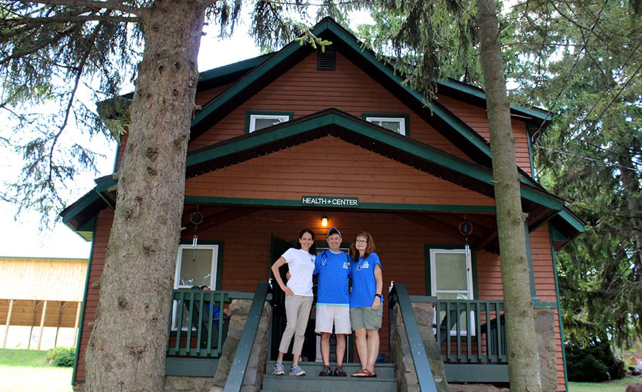 Staff on health center porch