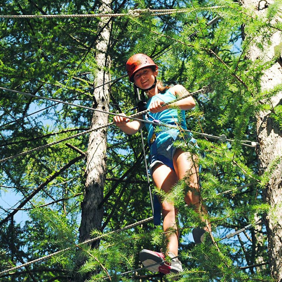 Camper on high ropes course