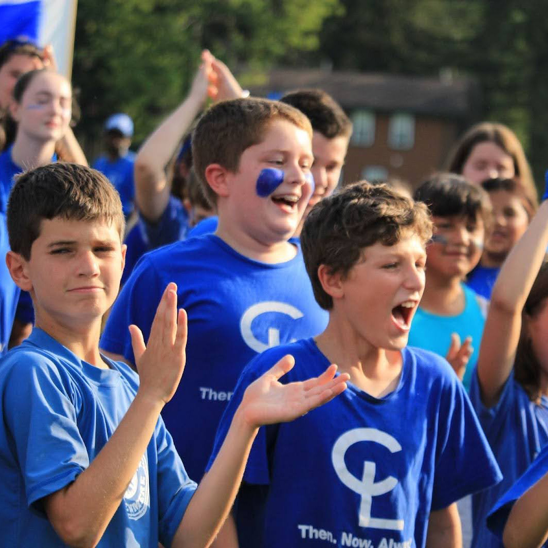 boys cheering at camp.